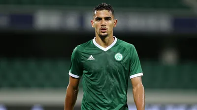 Mid-30s anonymous Cercle Brugge midfielder, athletic build, intense gaze, dark green shirt with white collar, white...