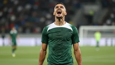 Mid-30s anonymous Cercle Brugge forward, lean muscular build, head tilted back, eyes wide, mouth open in a triumphant...